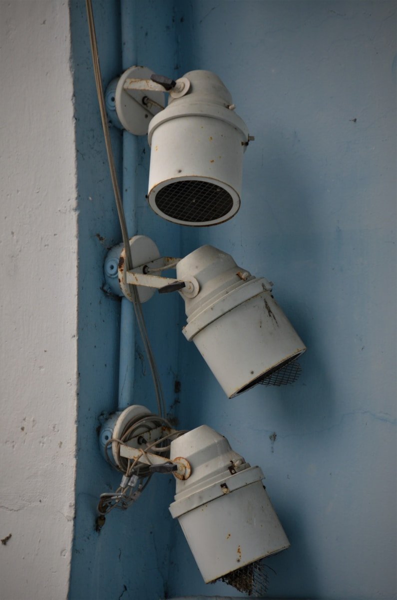 a white box with a hole in it and a white box on the side